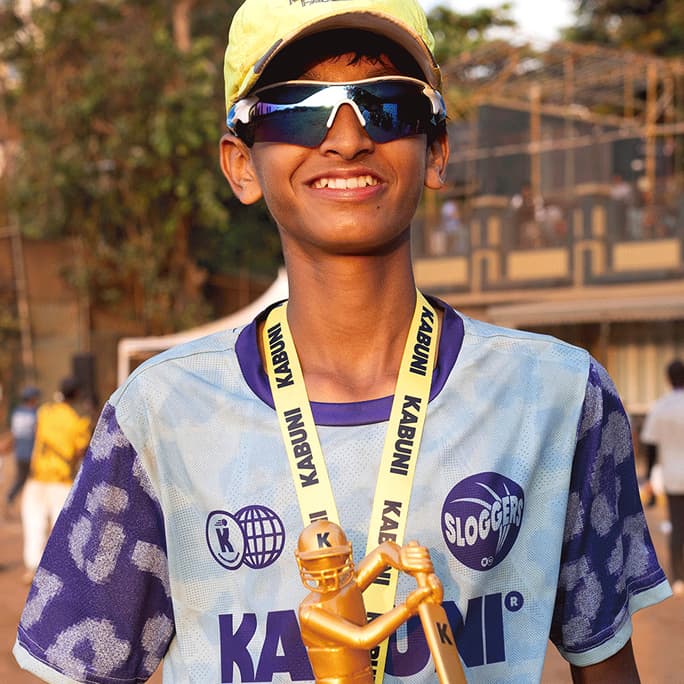 KPL Player with sunglasses and trophy